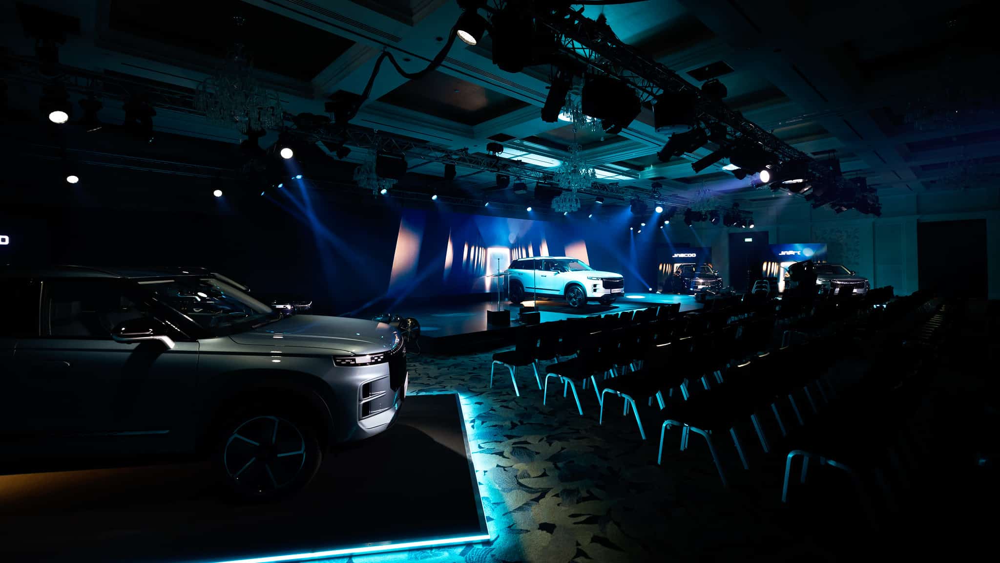 On Event Production Company | Live, Hybrid and Virtual Event Production | Exhibitions stand with cars and seating